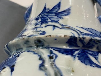 A Chinese blue, white and copper red vase with elephant handles, 19th C.